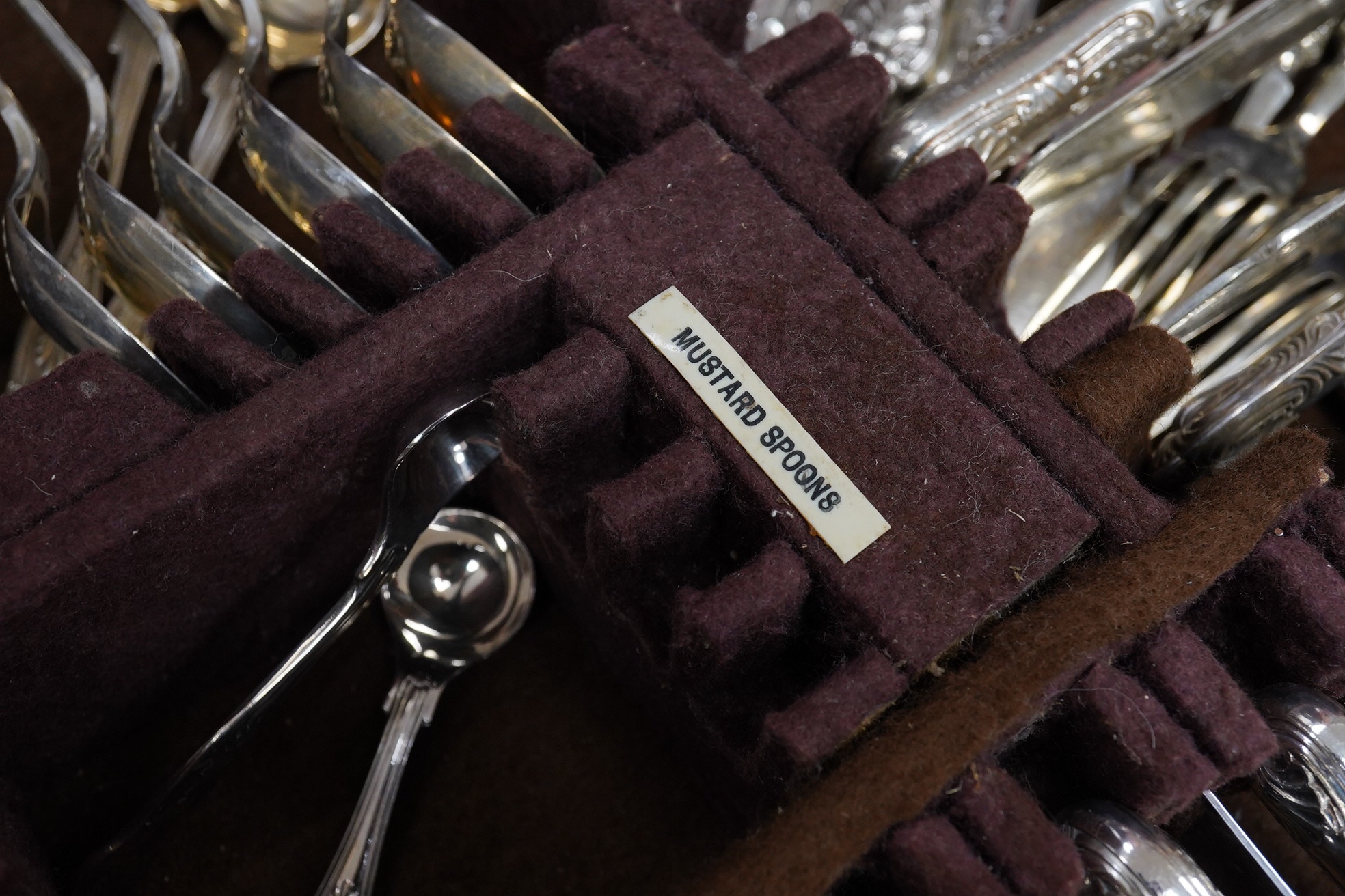 A mid 20th century comprehensive harlequin set of Kings pattern silver plated cutlery, mahogany cased, 90cm wide. Condition - fair to good